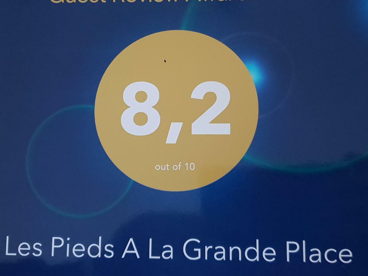 Les Pieds A La Grande Place *
